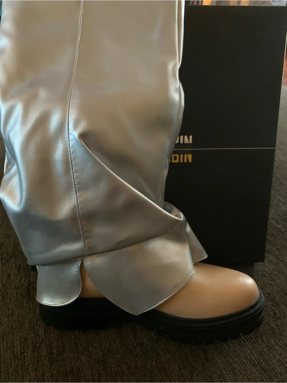 Cape Robbin striking metallic silver fold-over lug-sole boots feature a tan base
